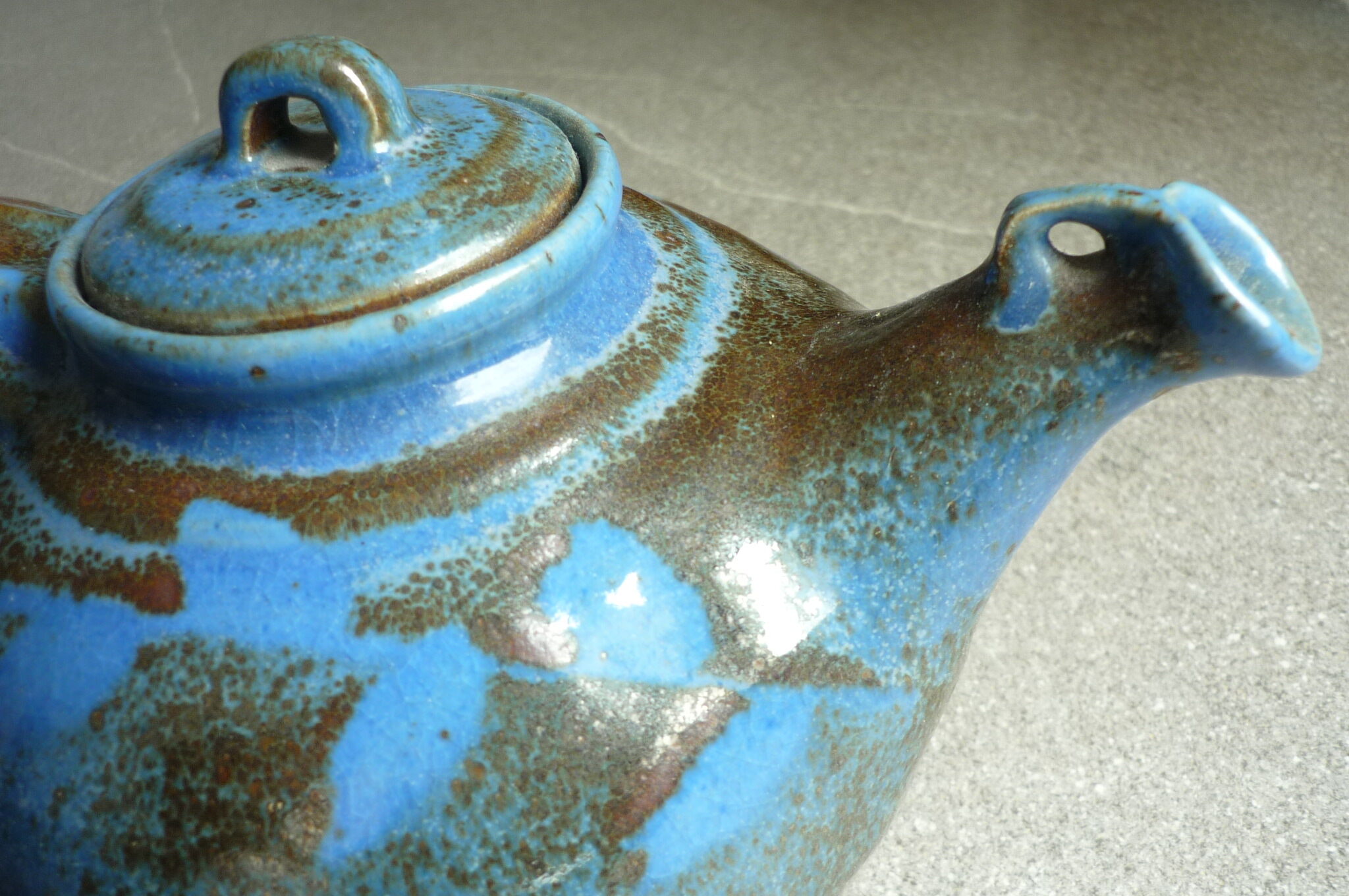 Vernified and flamed sandstone teapot, and its milk pot