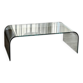 Sculptural coffee table in curved 12 mm glass – minimalist design