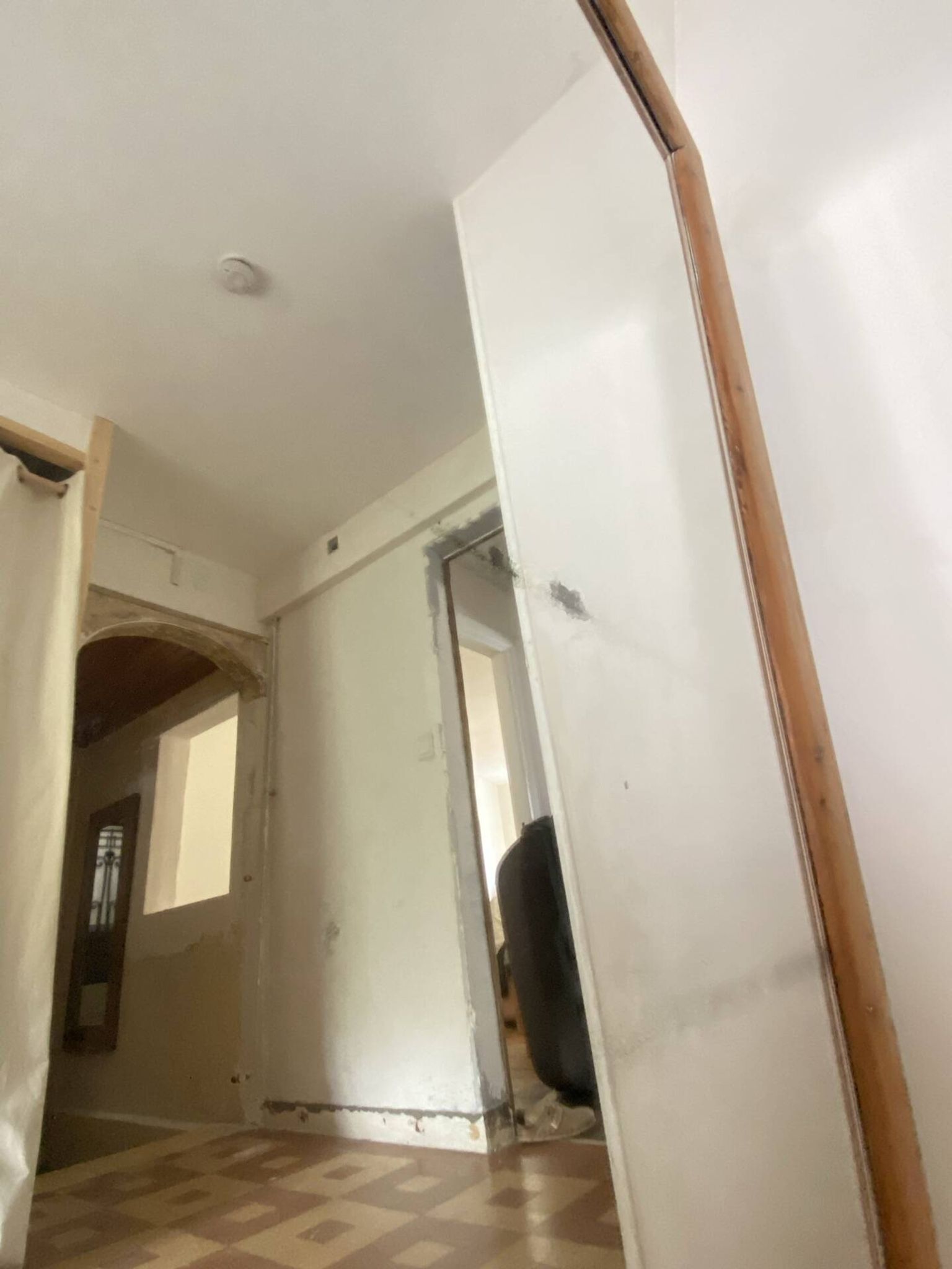 Very large mirror in antique pine.