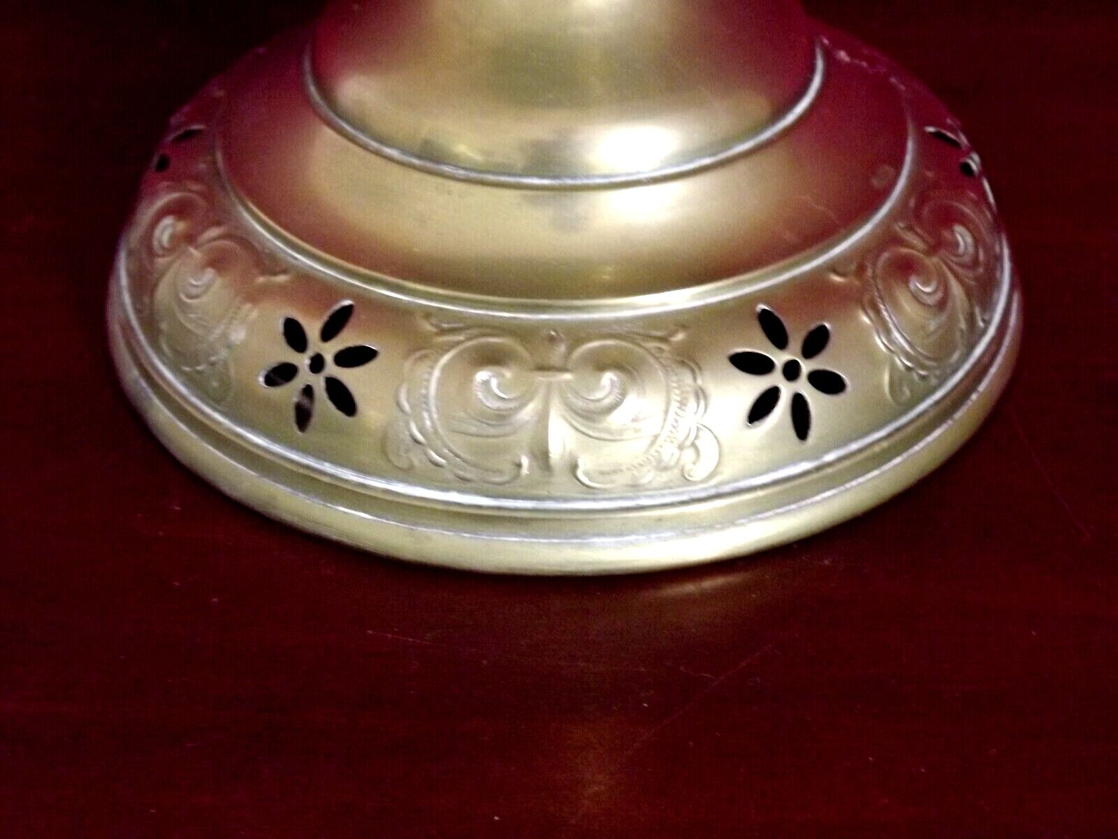 Vintage brass oil lantern with decorative base and transparent glass funnel stamped L B Brand Delay 4399.