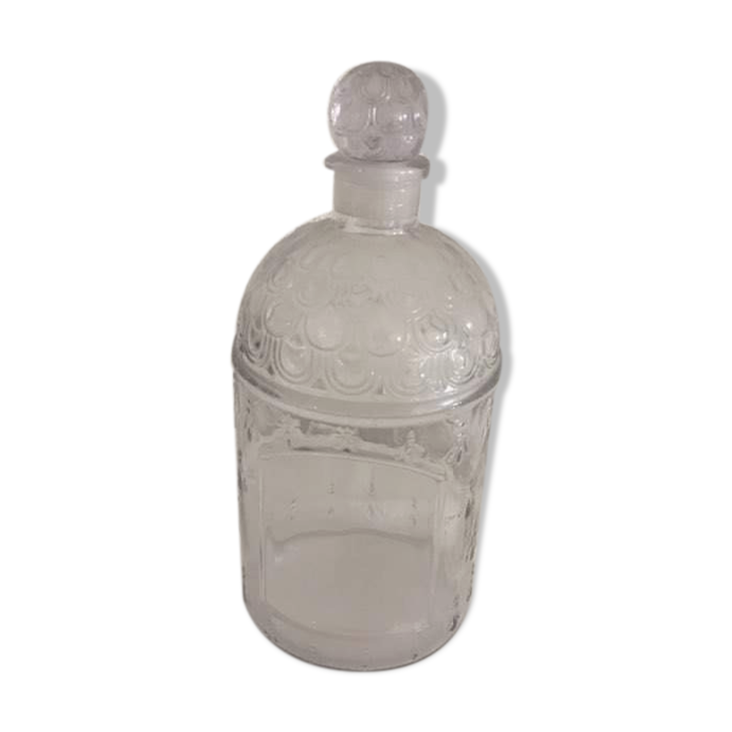 Guerlain bottle with bees.