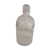 Guerlain bottle with bees.
