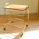 Vinyl service in gilded metal, with wooden top