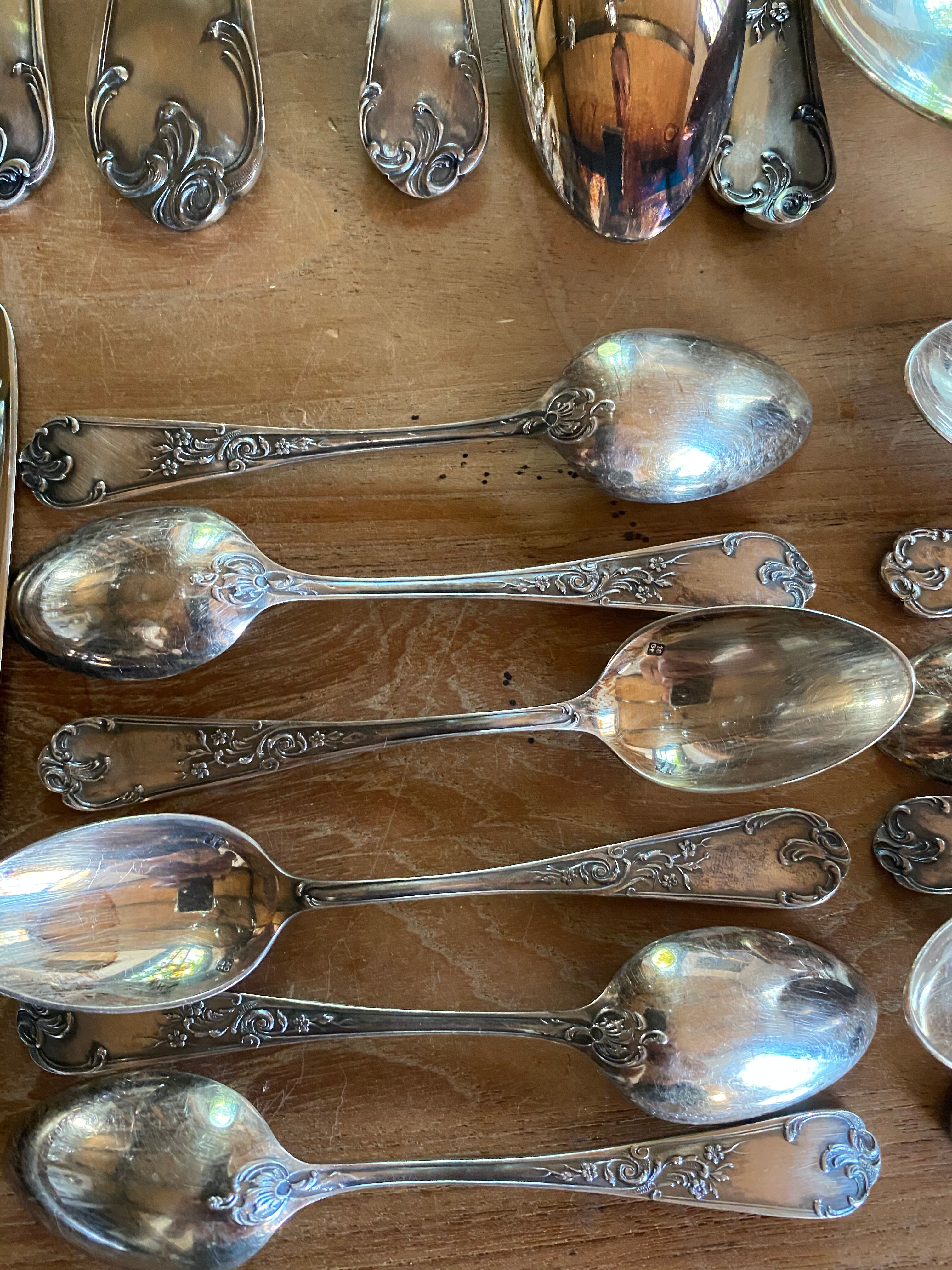 Complete silver metal cutlery housewife for 12 people