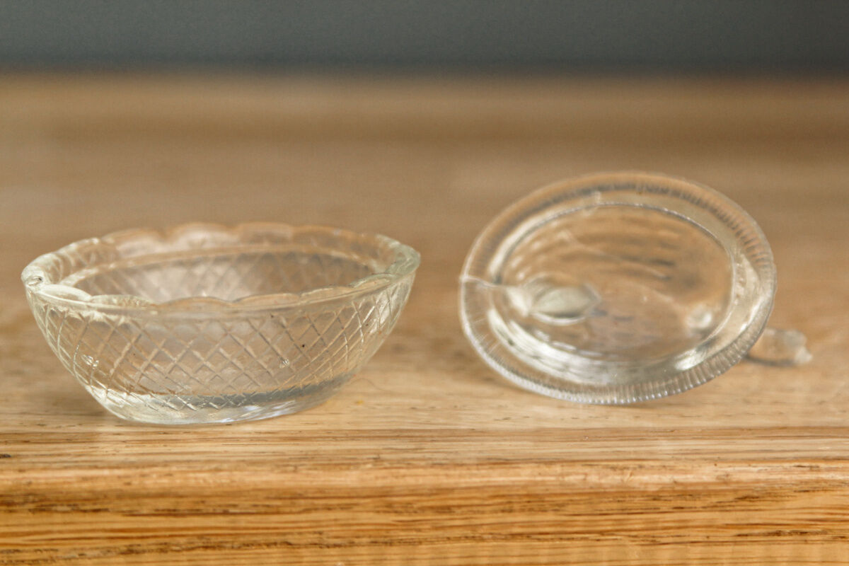 Pair of "chicken" salerons made of molded glass