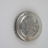 Small round box with silver pills