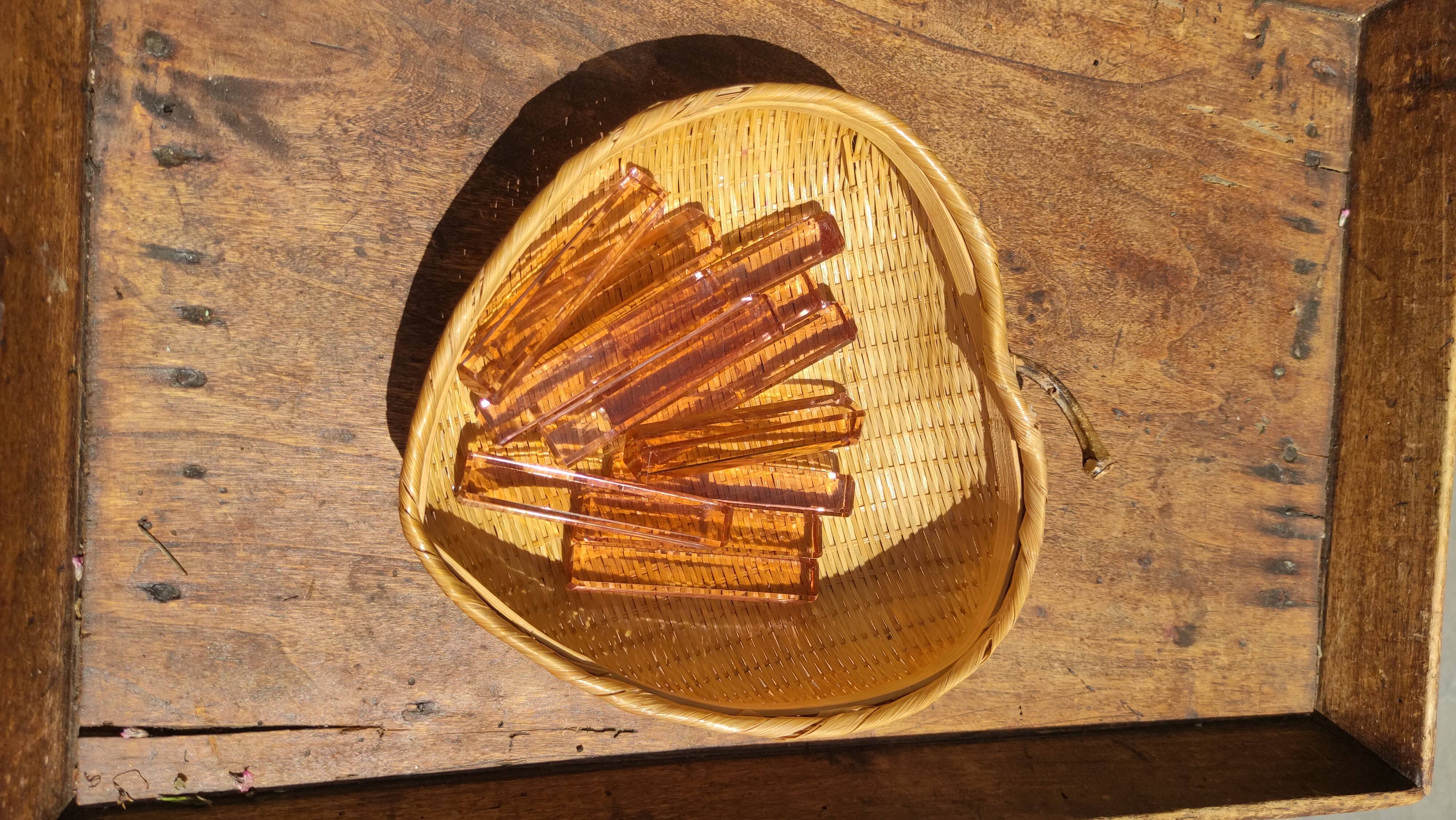 Ten pink glass knife holders