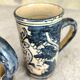 Set of two large vintage glazed terracotta mugs.