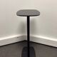Table basse ovale en métal noir