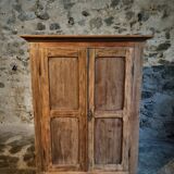 Antique French wardrobe in oak and pine, late 19th century.