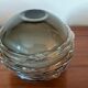 Smoky glass spherical vase with spiral applications from the 1970s.