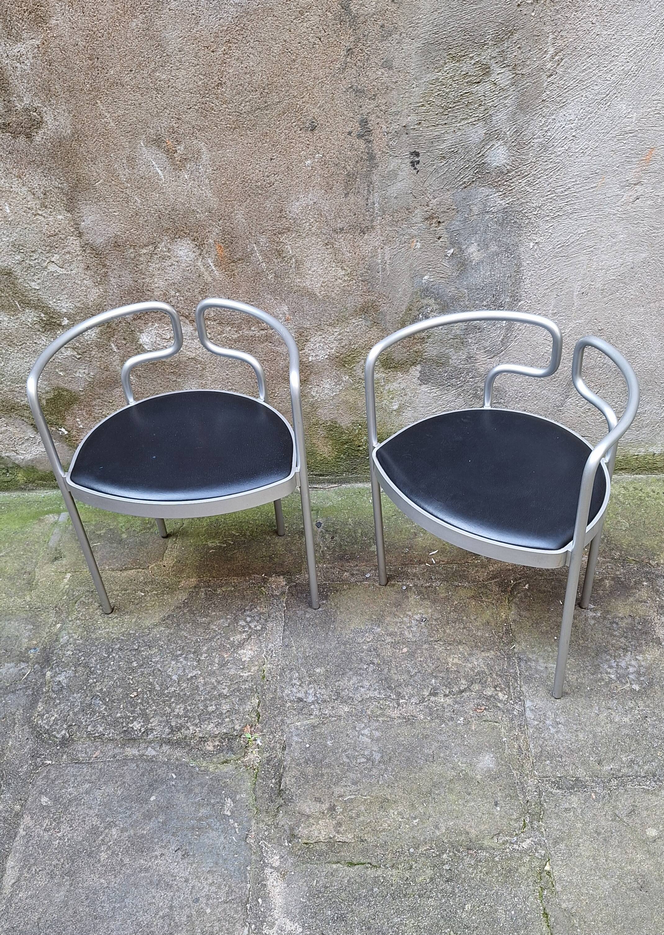 Pair of aluminum armchairs by Henning Larsen