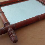 Old mirror in turned wood