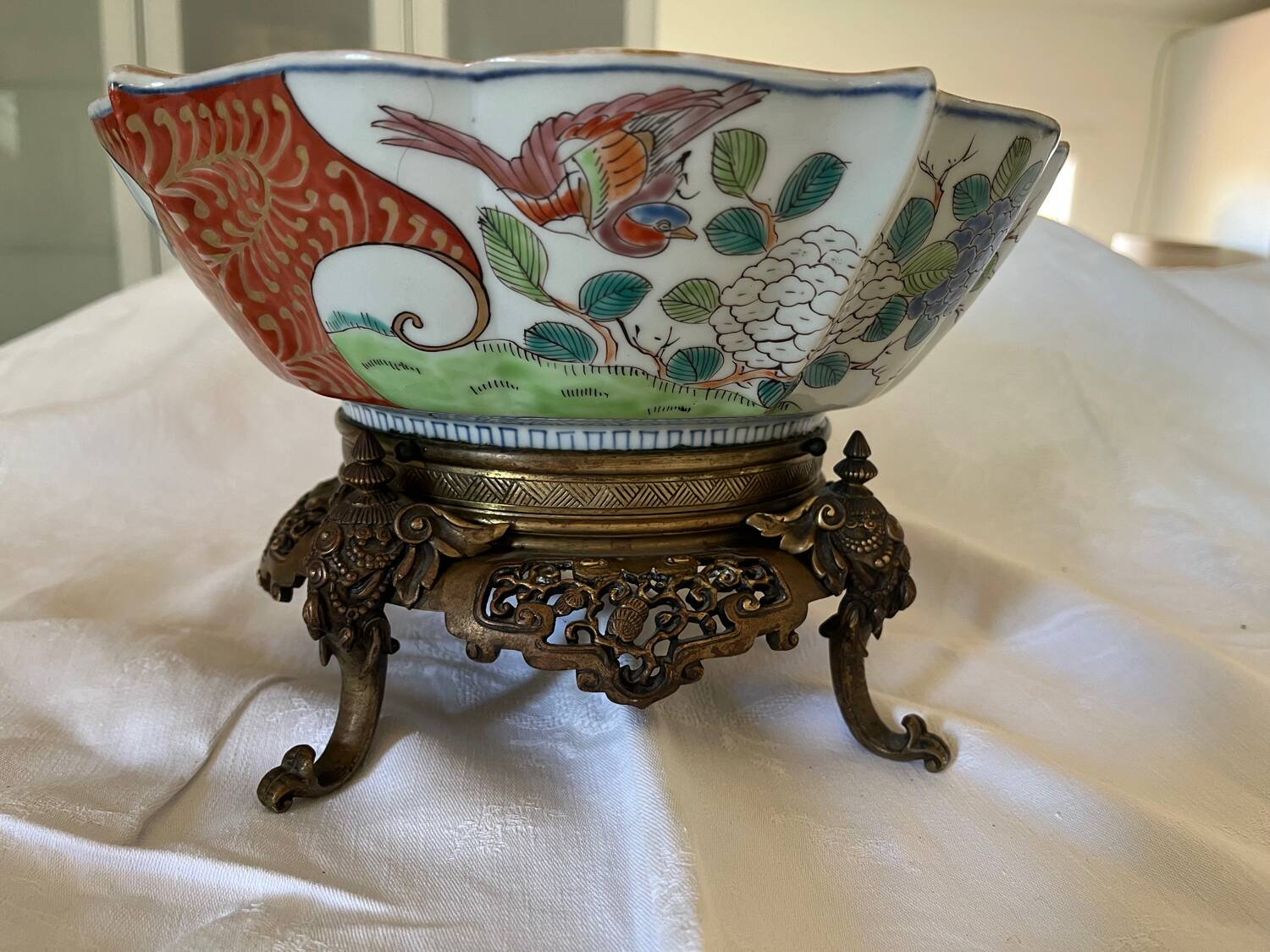 Chinese ceramic cup landscape patterns brass base supported by 4 elephants lai