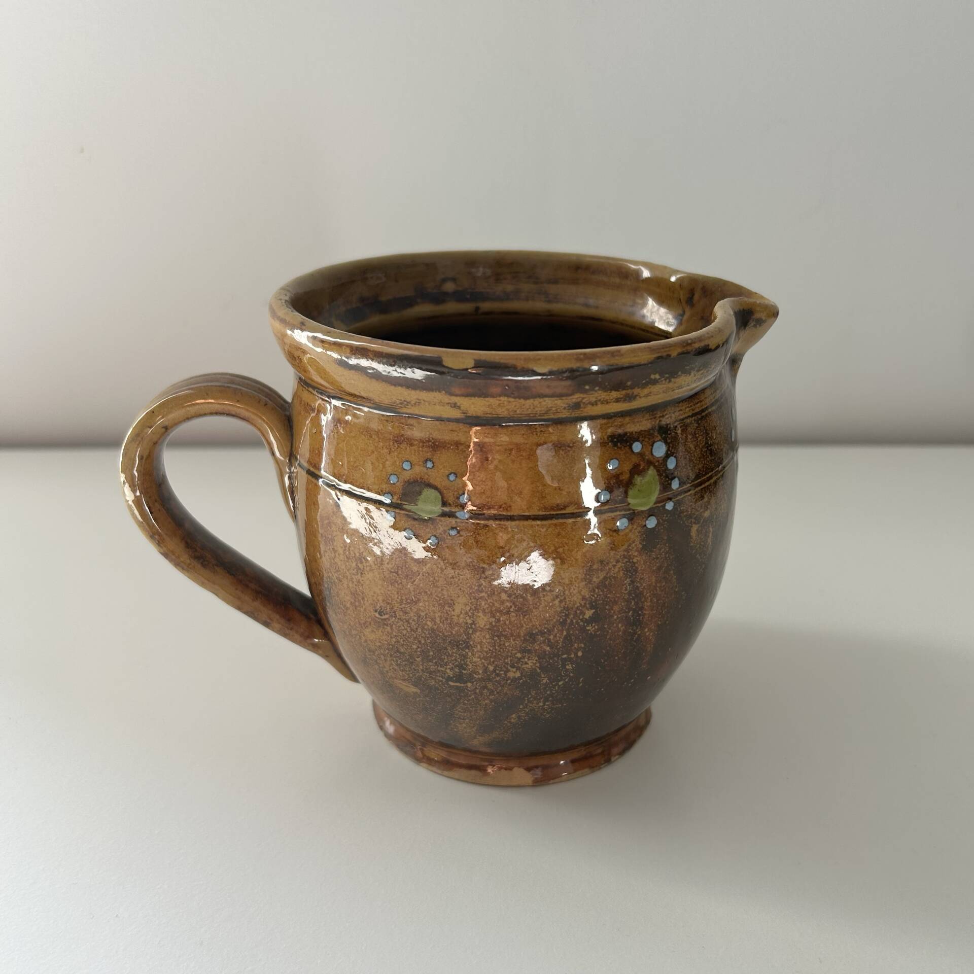 Provençal pitcher with floral decoration