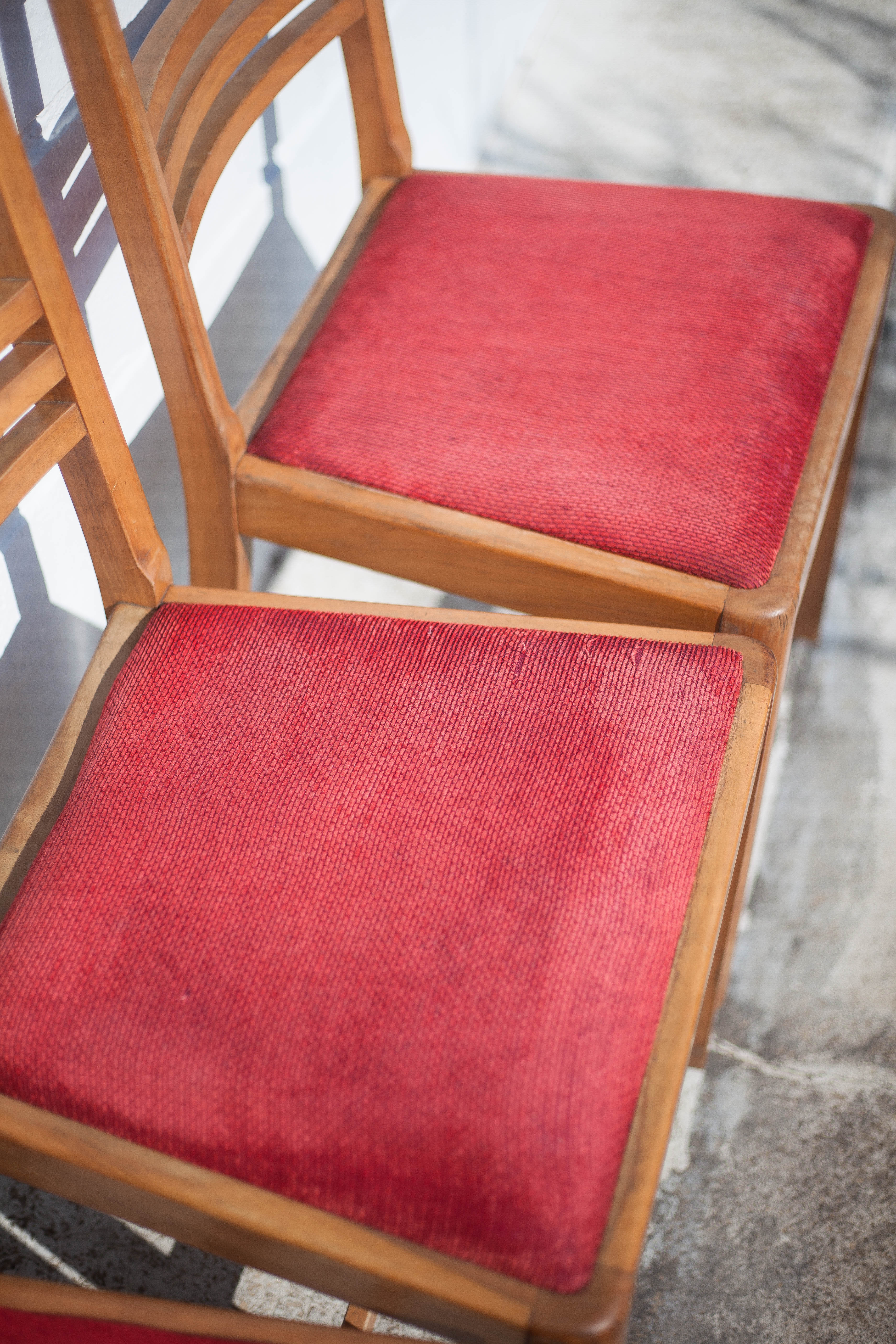 4 wooden chairs and velvet fabric