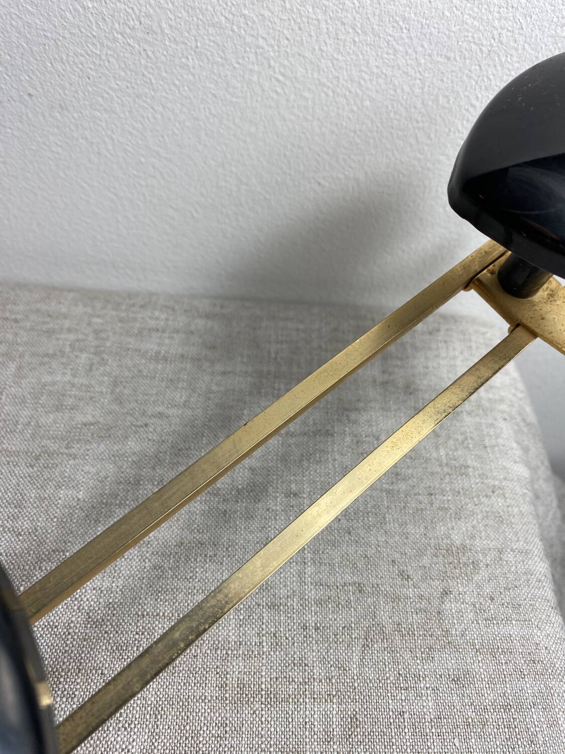 Wall-mounted coat rack with 3 hooks from the 1960s.