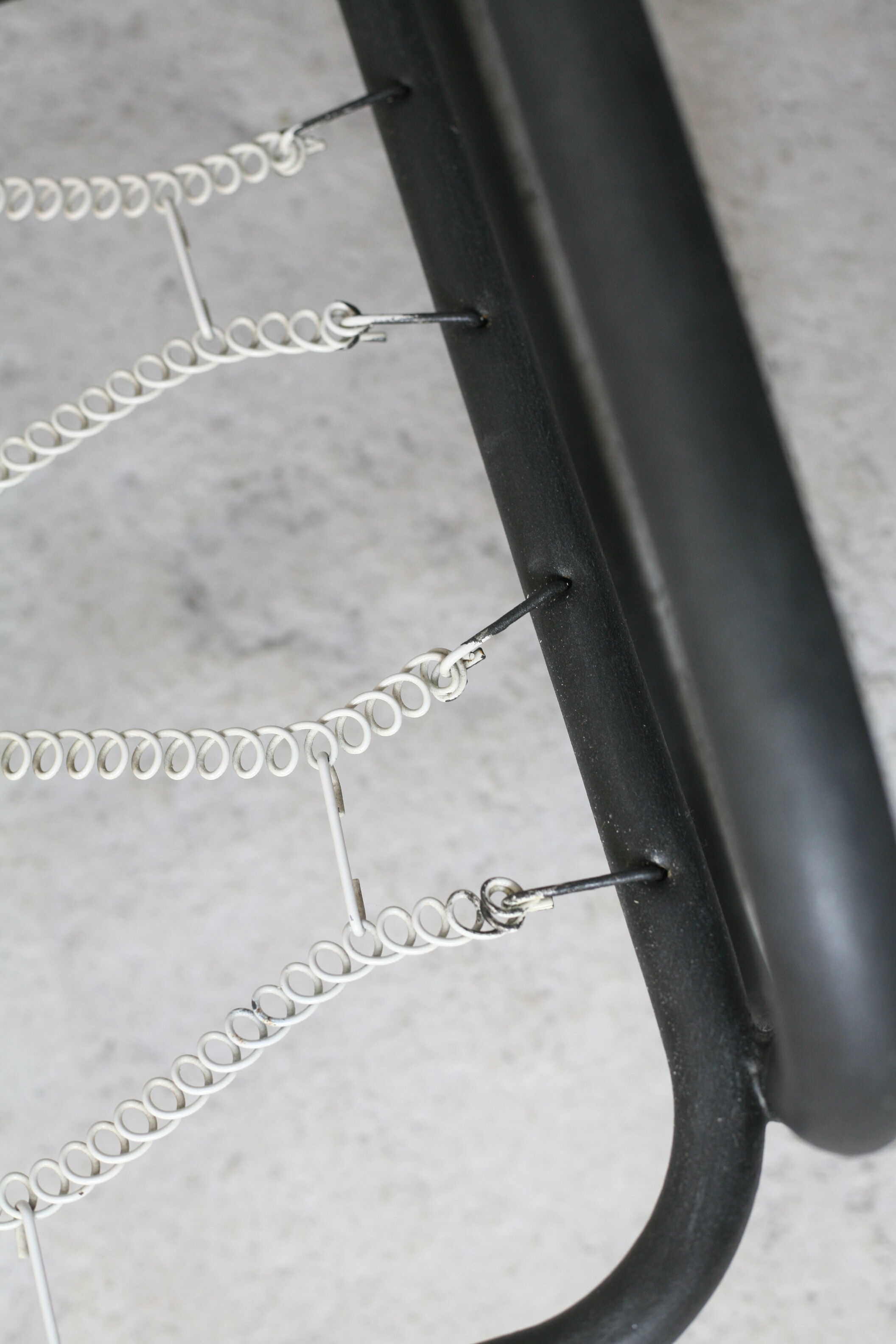 Pair of Prisunic edition armchairs, tubular steel and foam cushions, France, 1973