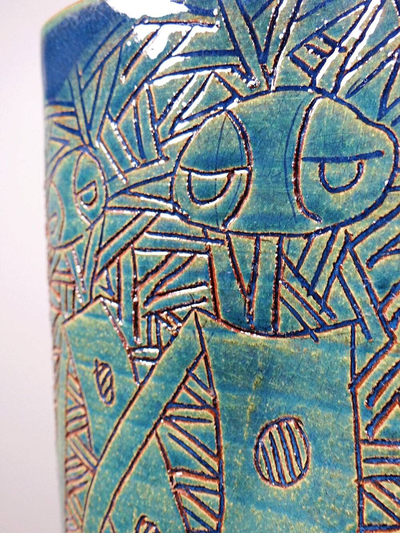 Vintage blue-green handcrafted pottery vase with incised tribal design by Eseka Pottery