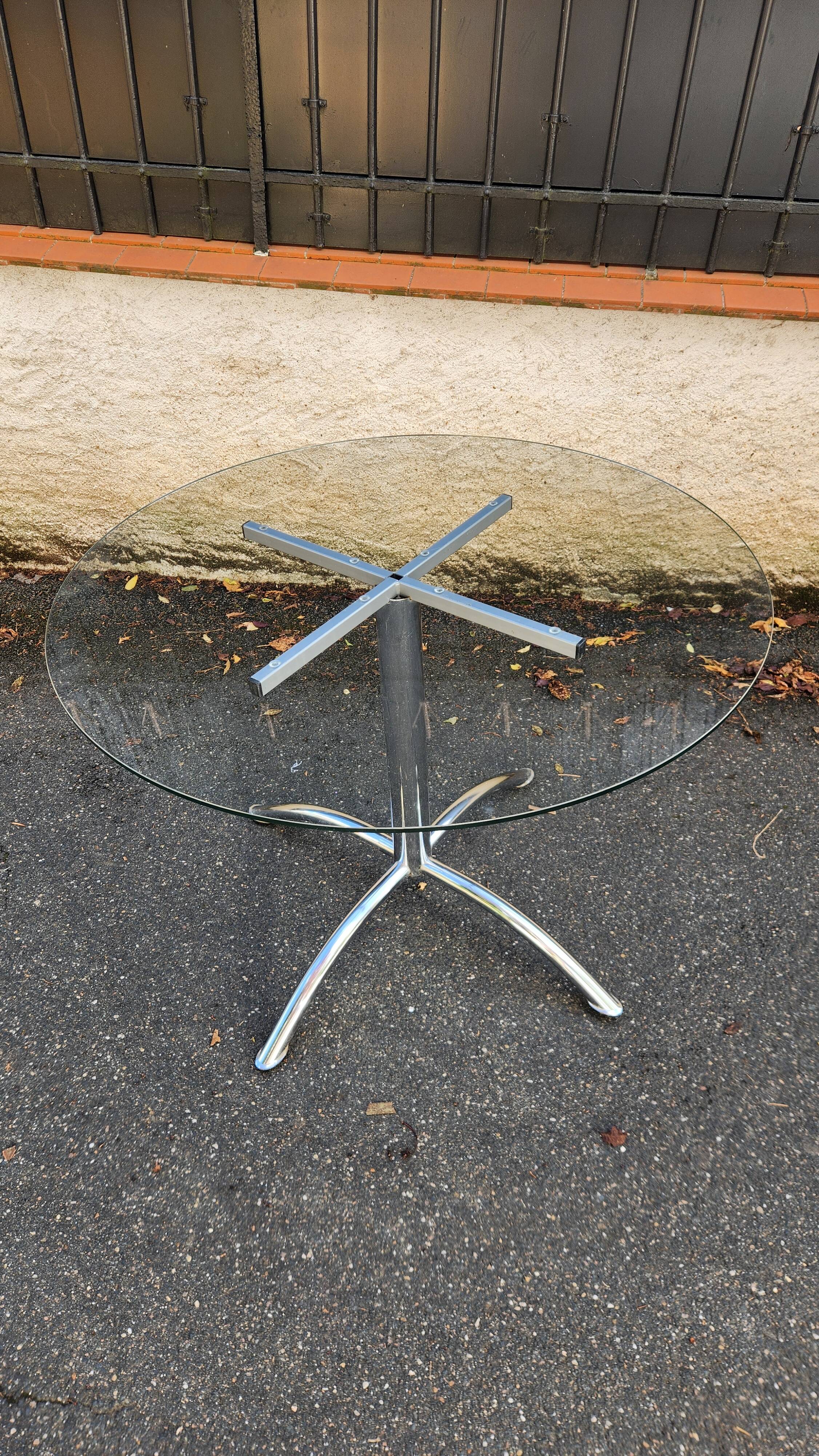 Chrome table with glass dining top from the 1980s.