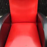 Pair of red and black faux leather armchairs