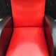 Paire de fauteuils en skaï rouge et noir