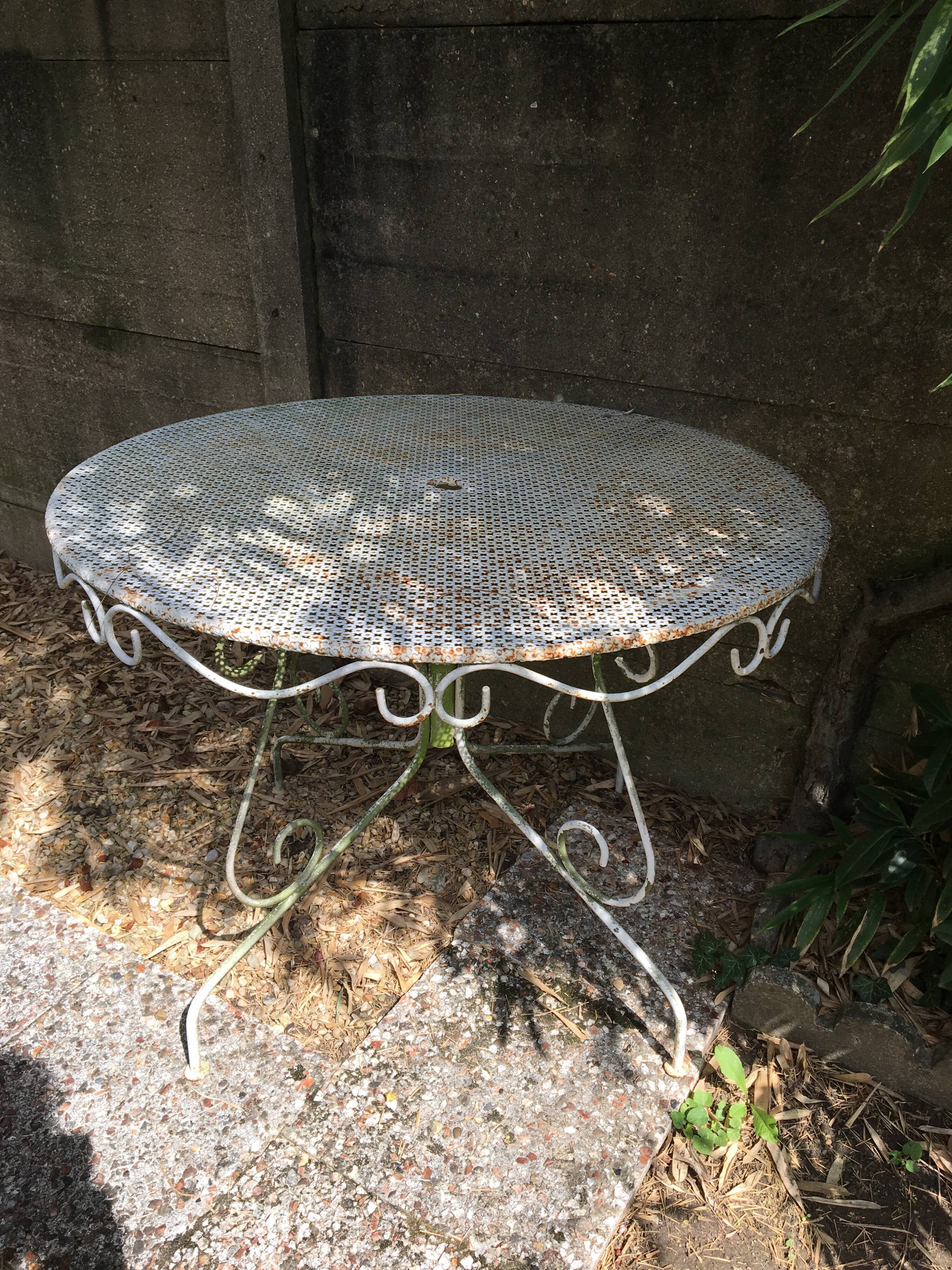 Vintage wrought iron garden table