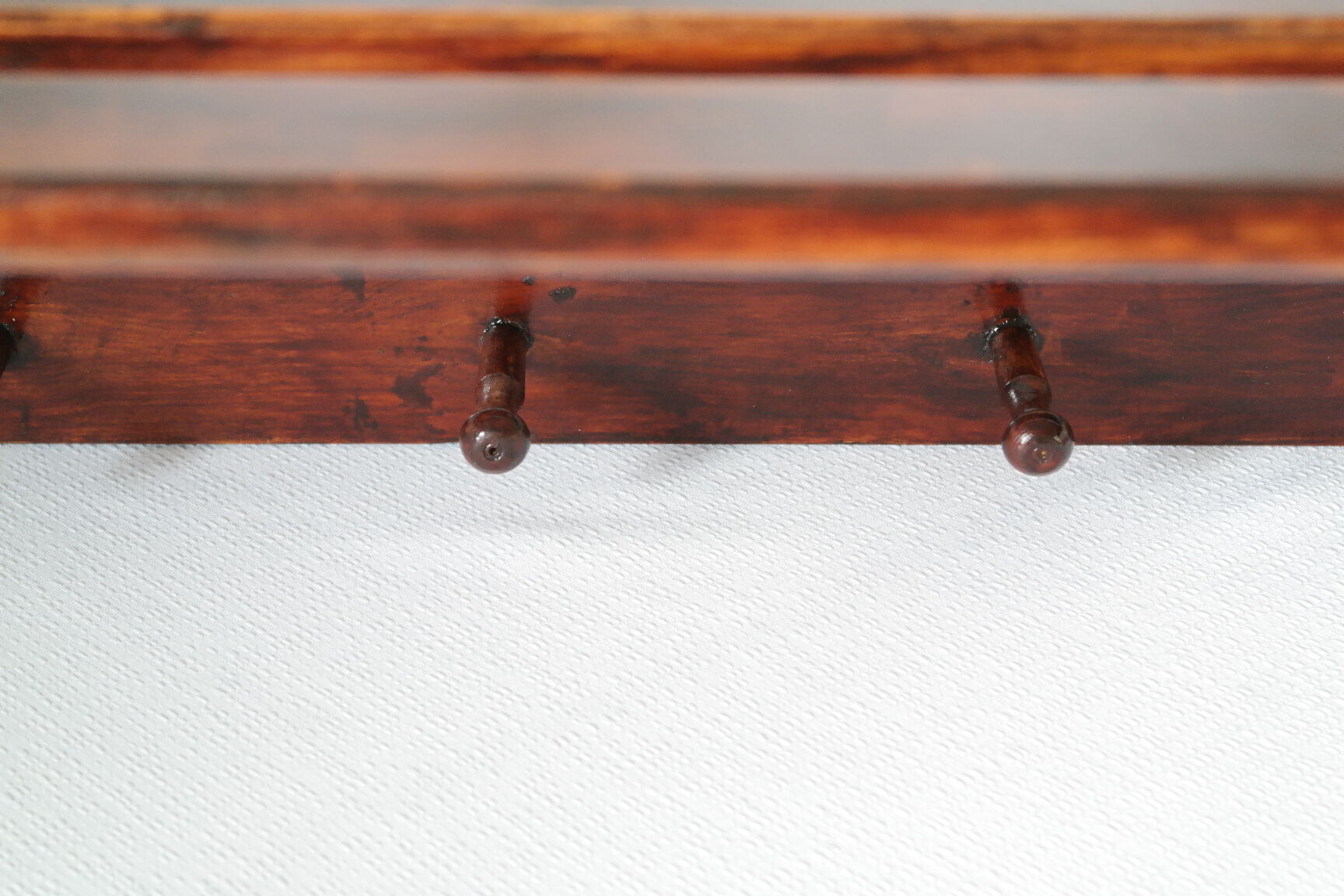 Vintage dark wood wall coat rack