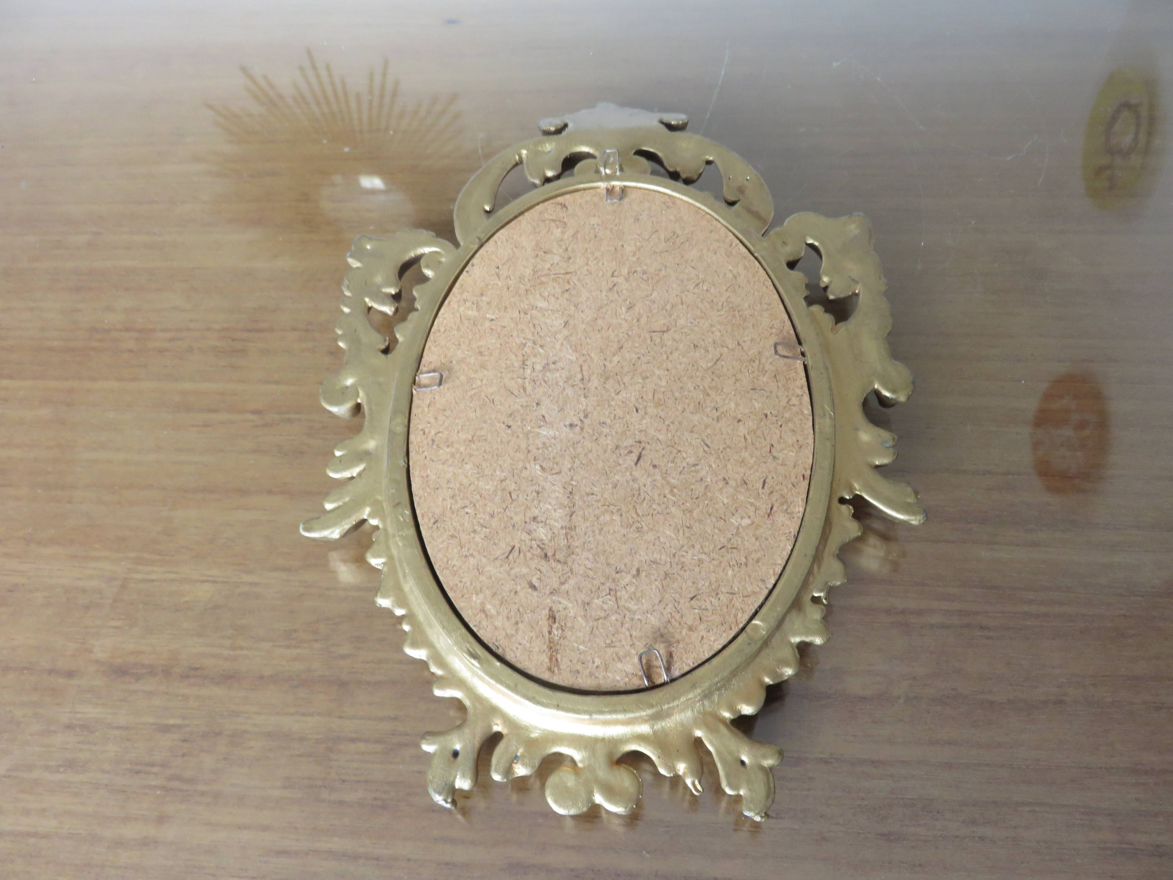 Small baroque mirror in gilded resin, made in Italy, 1970