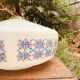 Suspension in opaline milk glass