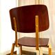 Chair in dark wood and ocher metal