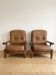 Paire de fauteuils vintage années 70 en chêne massif et simili cuir cognac