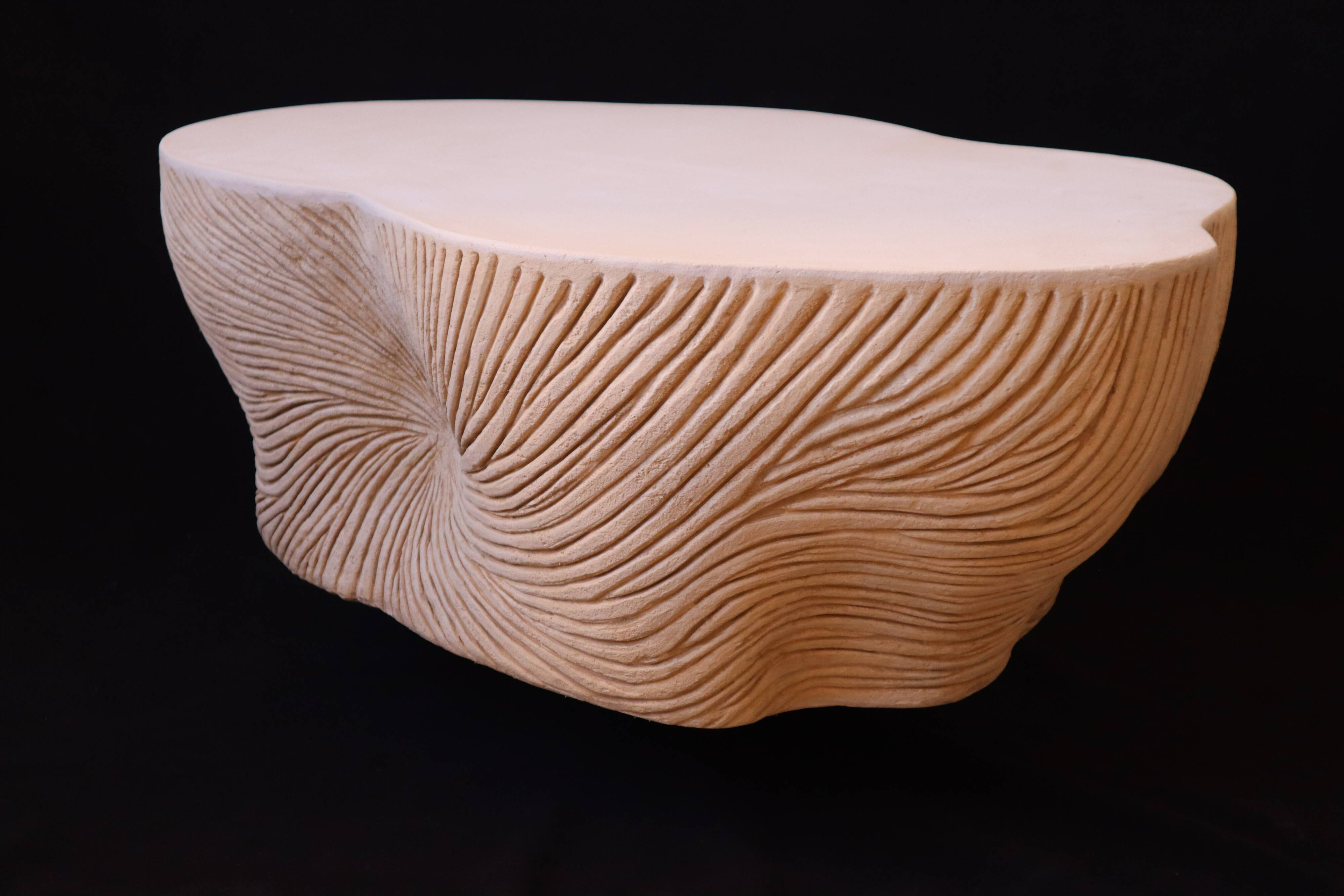Design coffee table with travertine rock effect — unique piece hand-sculpted.