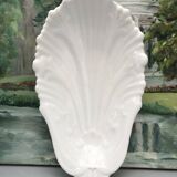 Scallop-shaped pocket emptier