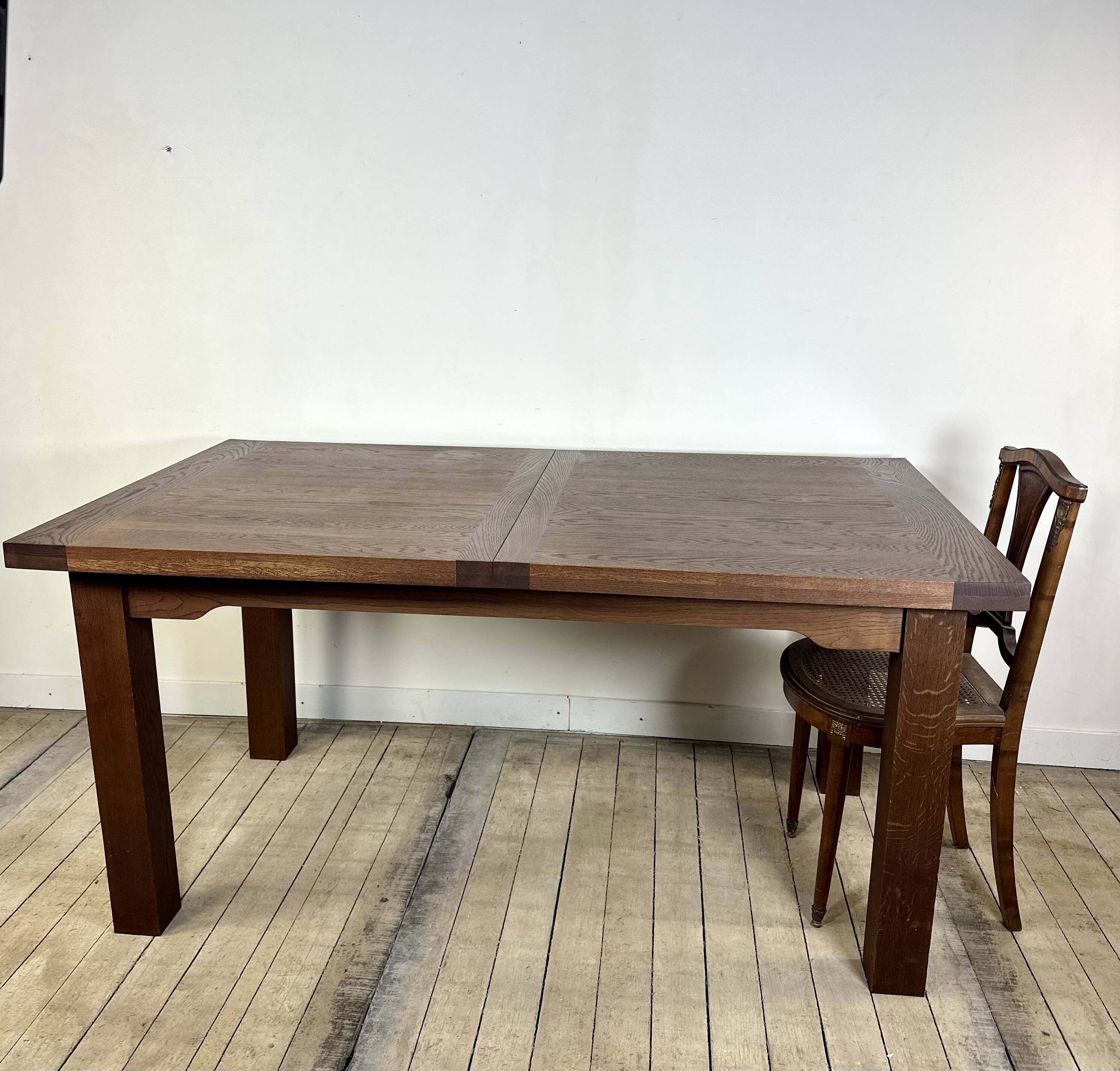 Brutalist solid oak table with 2 extensions from the 1990s.