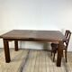Brutalist solid oak table with 2 extensions from the 1990s.