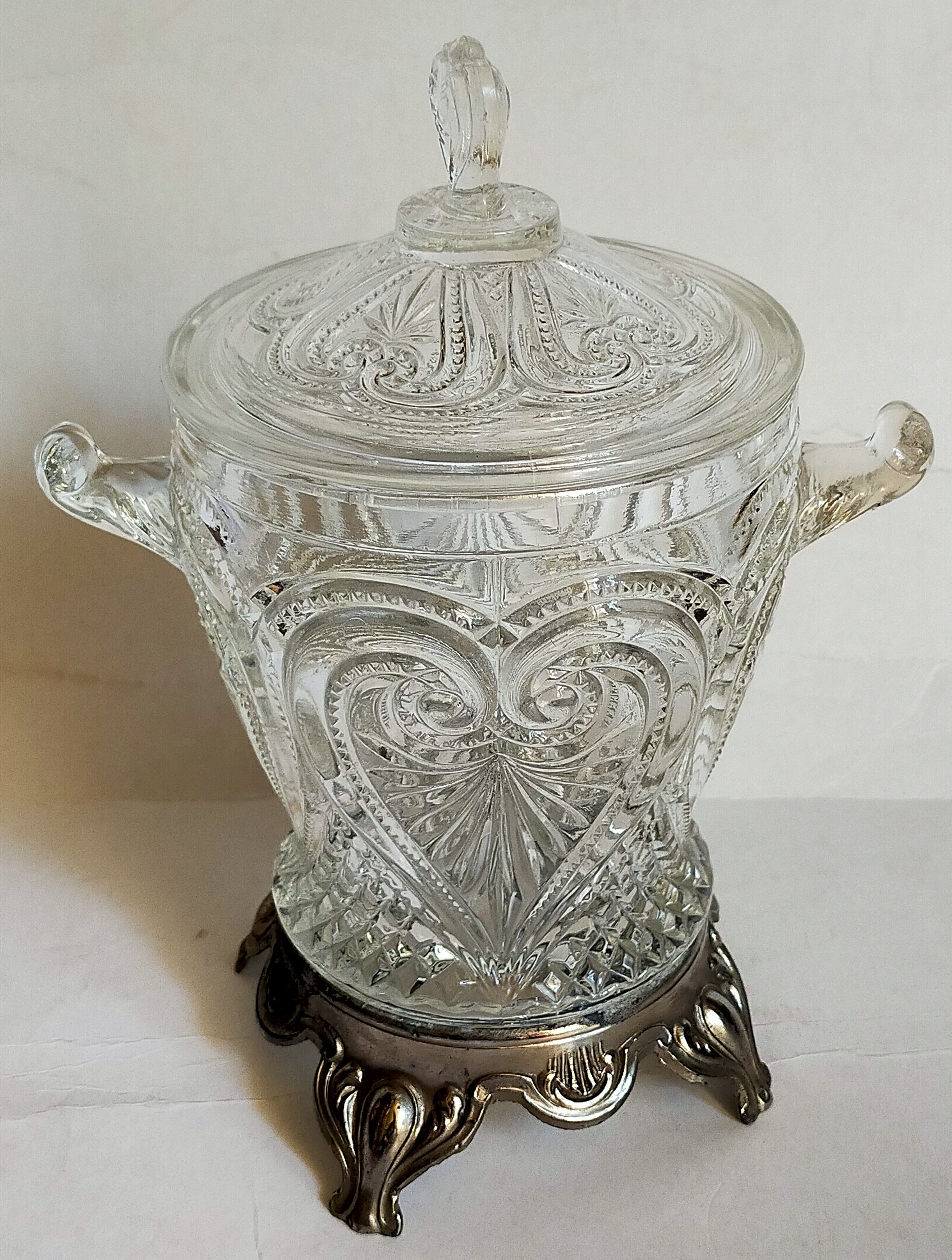 Antique glass compotier on metal stand