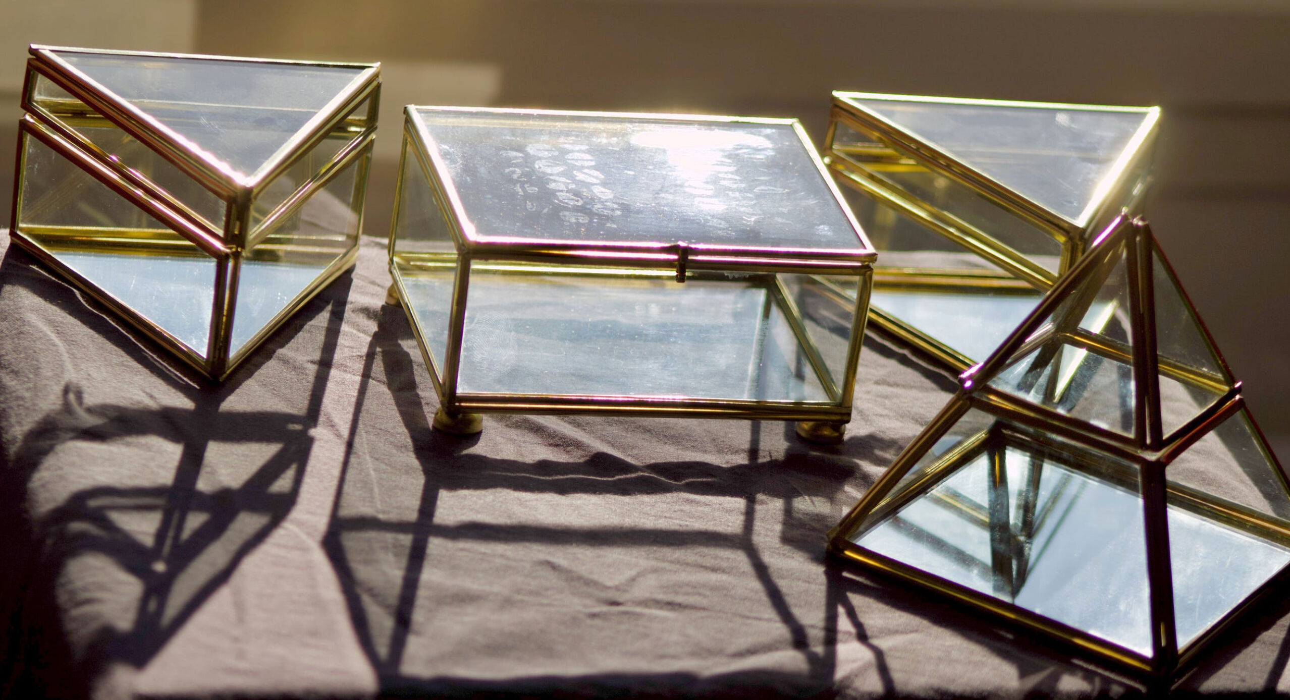4 old glass, brass and mirror jewellery boxes