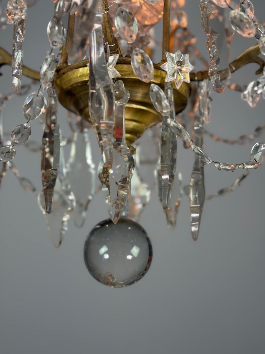 Bronze chandelier with cut crystal pendants, circa 1800.