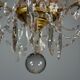Bronze chandelier with cut crystal pendants, circa 1800.