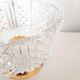 Chiseled crystal bowl with gilded metal base