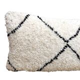 Bohemian wool pillow cover on a Beni Ourain Berber cushion. The cushion cover