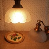 Pair of frosted glass flower pendant lights with vintage wood and brass