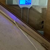 Large HST painting depicting a floral bouquet signed Lina Pont (?)