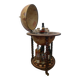 Vintage globe bar with storage for bottles and glasses.