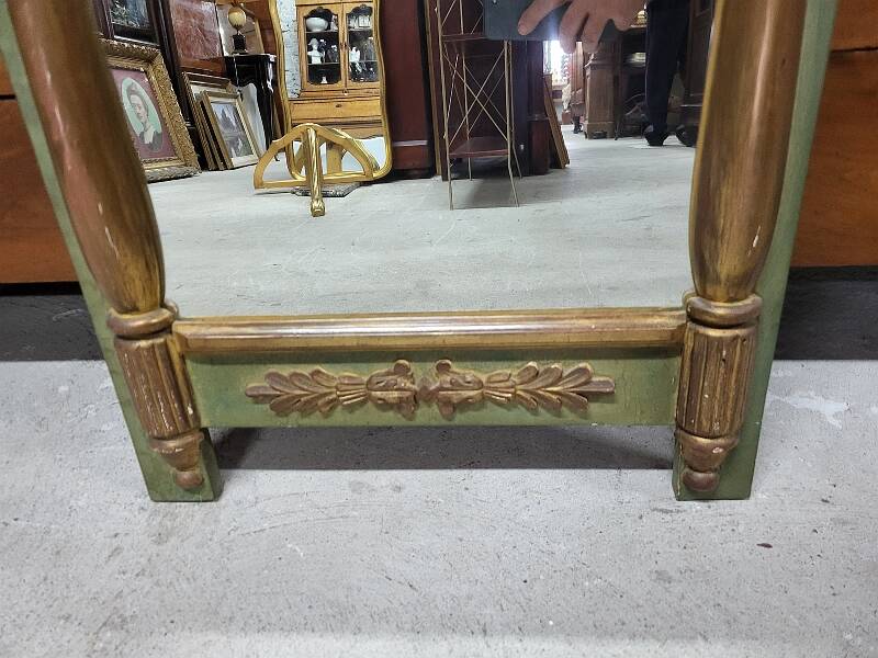 Empire style mirror in wood and gilding