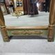 Empire style mirror in wood and gilding