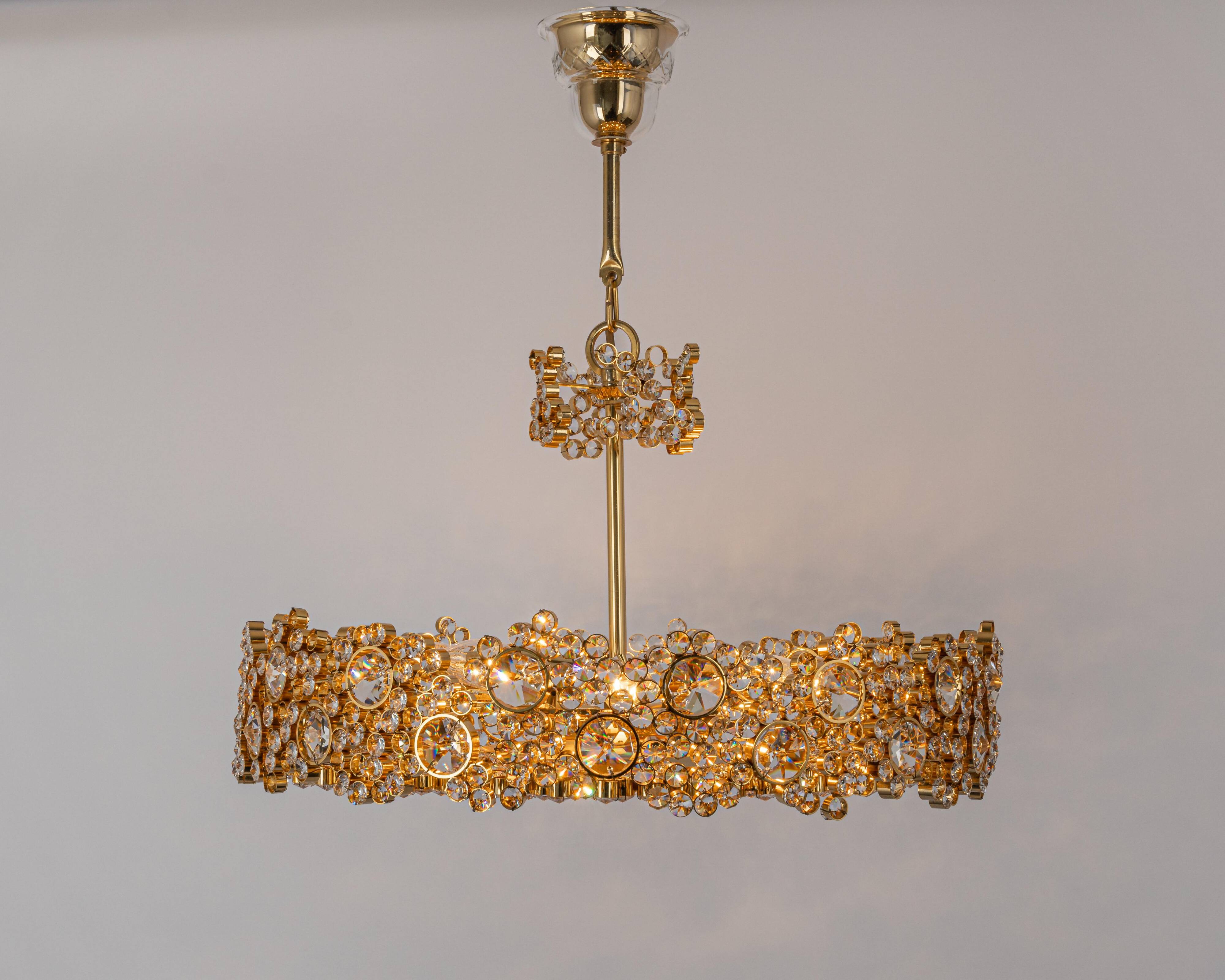 Chandelier in gilded brass and crystal glass inlaid by Palwa, Germany, 1970s.