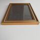 Photo frame under glass, gilded wood