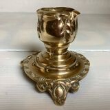 Tripod candlestick in worked bronze